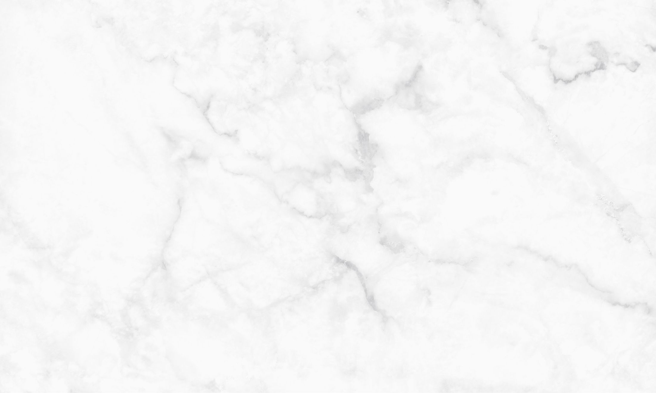 White marble texture with subtle grey veining.